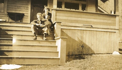My grandparents on the front porch steps of the house.  These steps are no longer there.