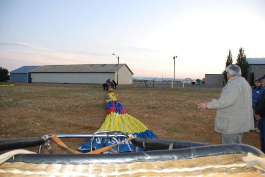 Unrolling the balloon from the bag.