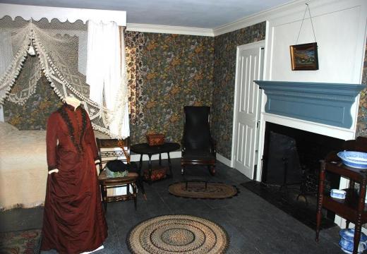 Aldrich house room with period costume.