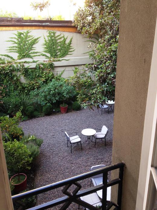 The view from our room at Le Reve into their private backyard seating area.