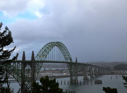 The Newport, Oregon bridge, with the usual Oregon weather of rain squalls and sun.