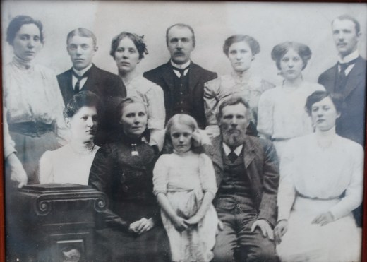 My grandfather Hans Kristian and his 9 siblings and parents.  He is second from the left in the back row  