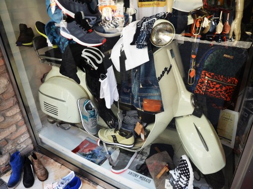 Vespa in the same shop window