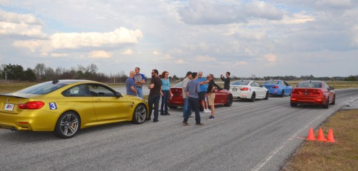 The entire group waits in the pit area as each participant ran the Big Track in the M3