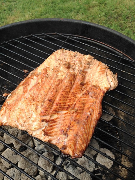 King Salmon grilling over briquettes. I'm not a fan of gas grills.